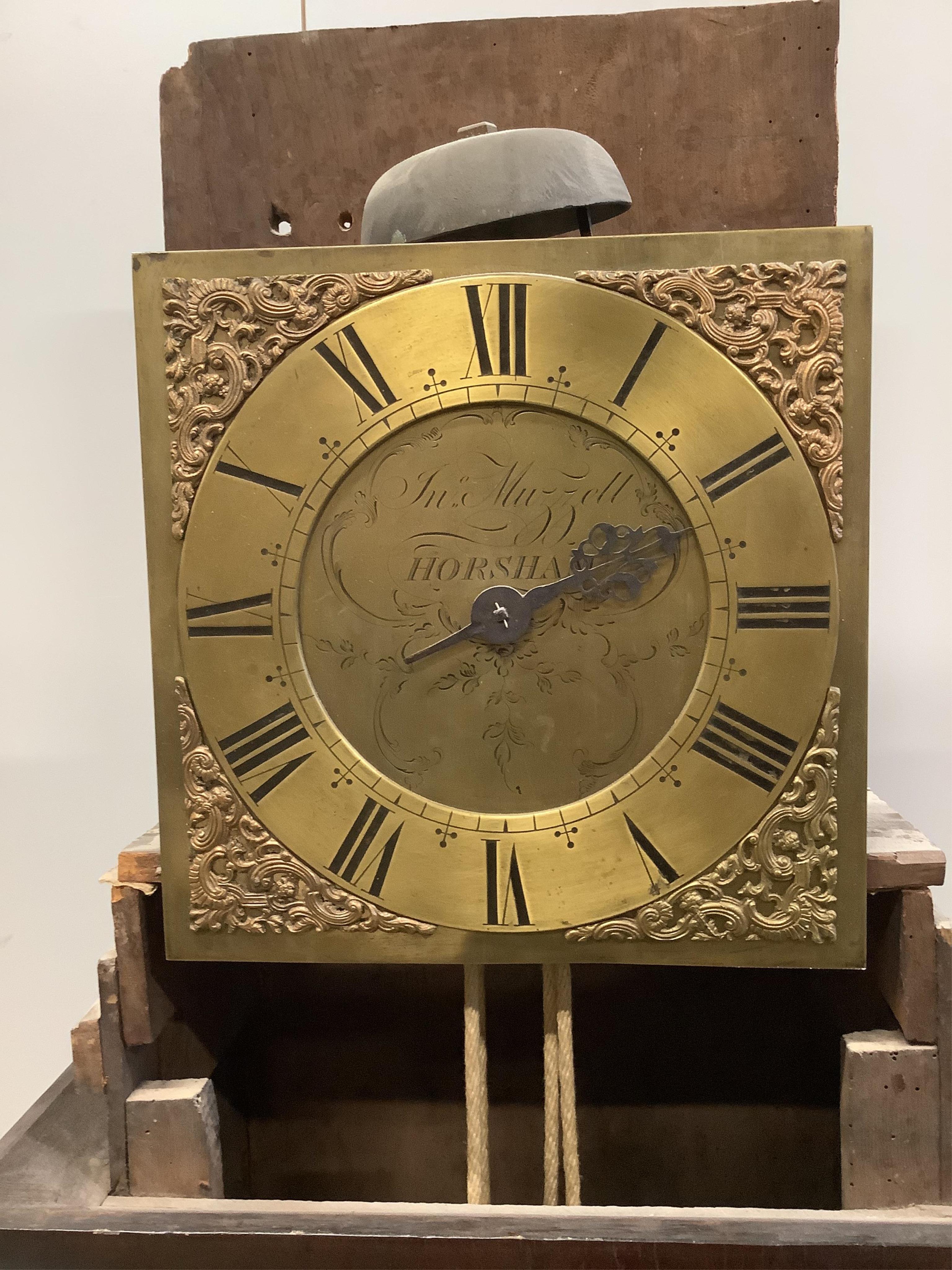 An 18th century oak thirty hour longcase clock by Jno. Muzzell, Horsham, height 183cm. Condition - poor